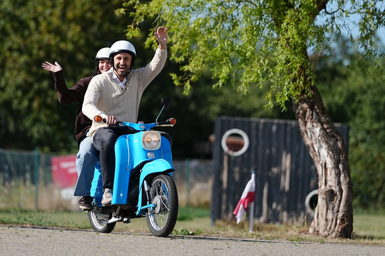 Ulrich Siegmund, AfD's top candidate and co-chair of the AfD parliamentary group in the Saxony-Anhalt state legislature, arrives at a polling place on a Simson Schwalbe with his wife, Julia Siegmund.