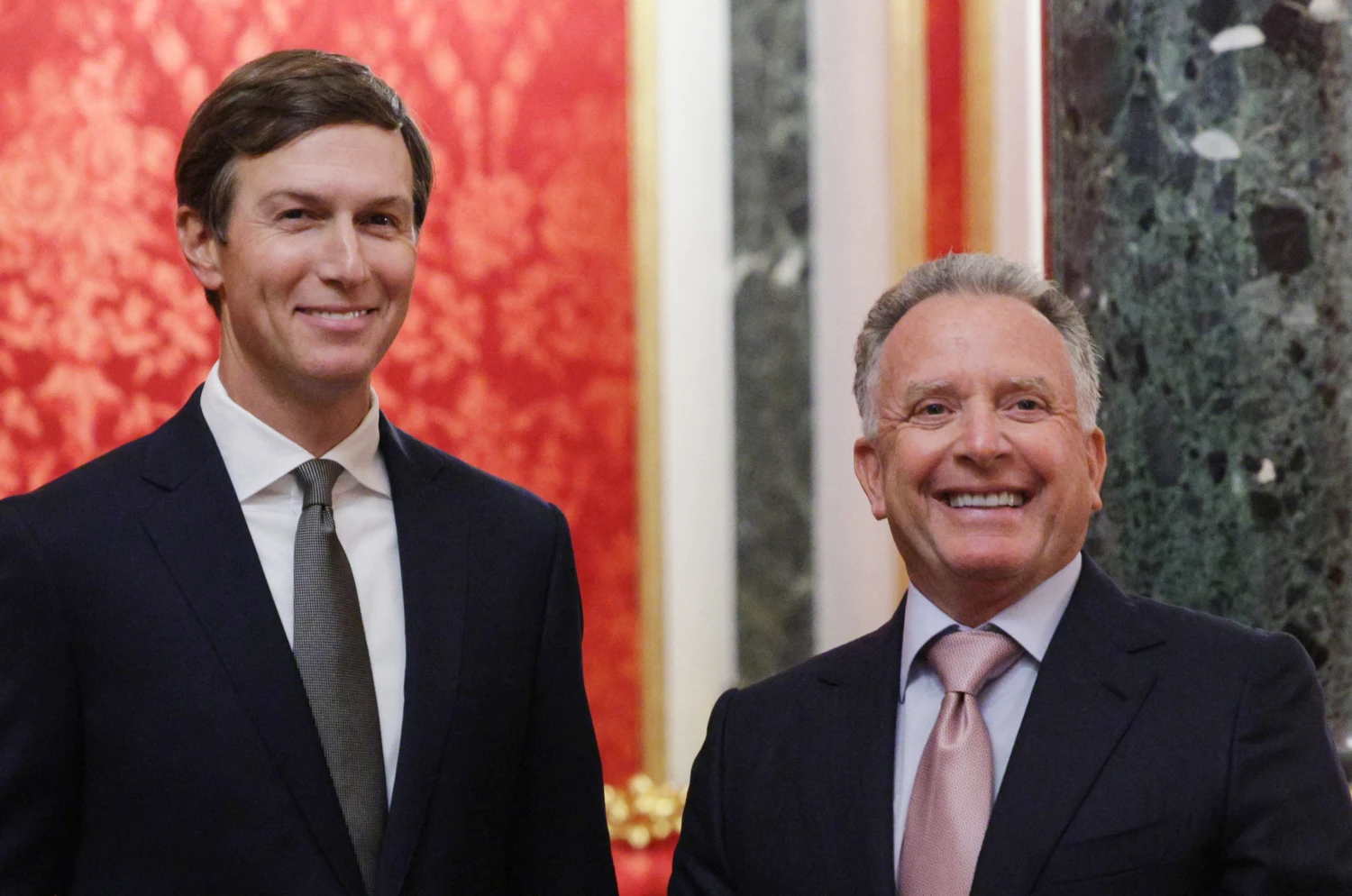 U.S. President Donald Trump's son-in-law Jared Kushner (L) and US Special Envoy Steve Witkoff (R) smile prior to their meeting with Russian president in Moscow on Sept. 5.