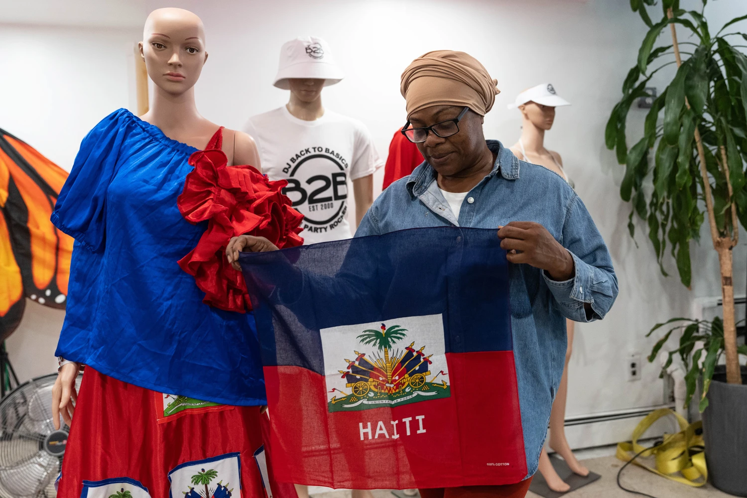 Haitian-born Edwina Paul holds Haitian flag ahead of the West Indian Day Parade, Thursday, Sept. 3, 2026, in the Brooklyn borough of New York.