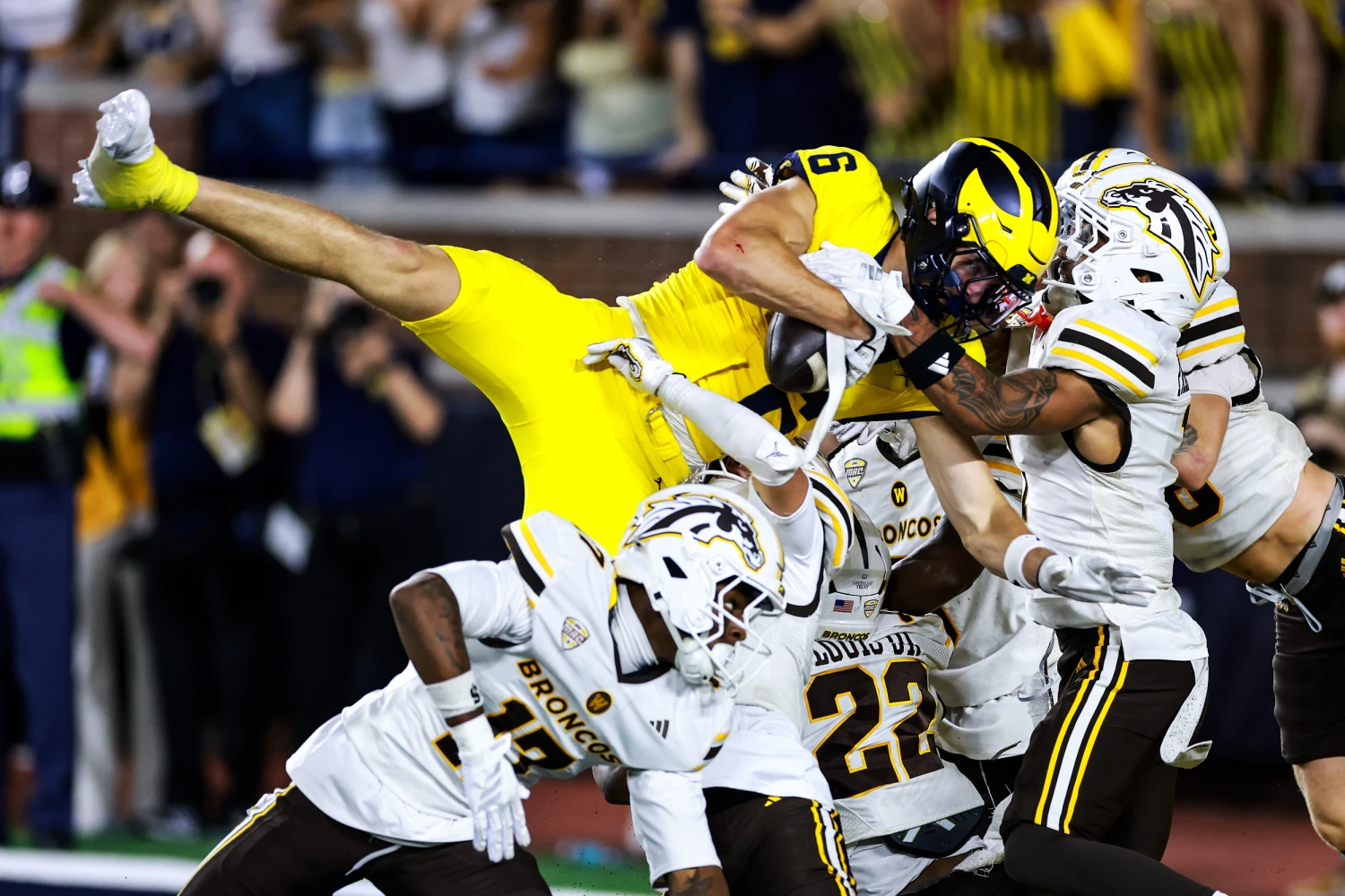 JJ Buchanan #6 of the Michigan Wolverines catches a game winning pass with no time left on the clock to beat the Western Michigan Broncos 13 to 12 at Michigan Stadium on Sept. 5, 2026 in Ann Arbor, Mich.