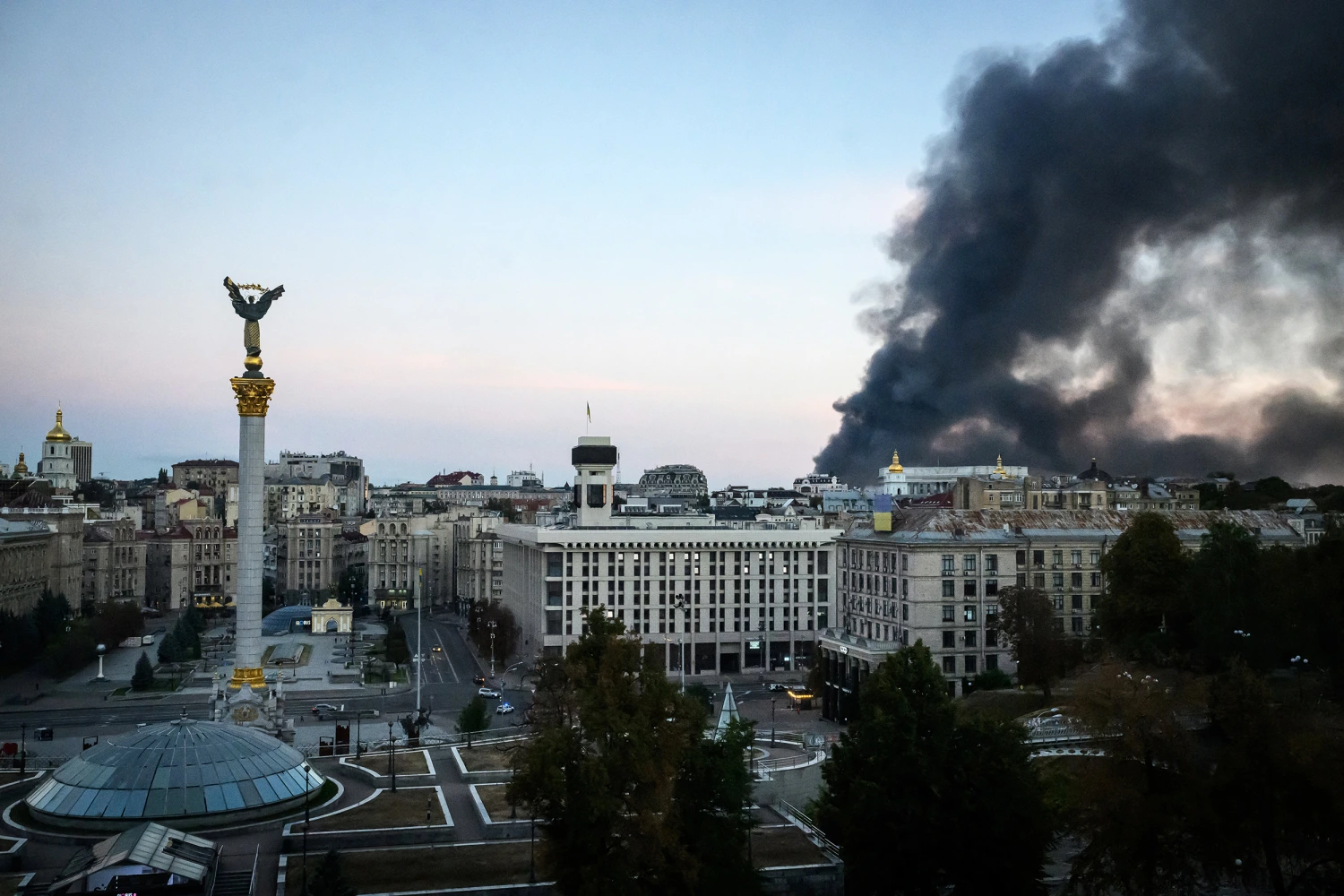 This photograph shows smoke rising over buildings following Russian air attacks, in downtown Kyiv on September 8, 2026, amid the Russian invasion of Ukraine.