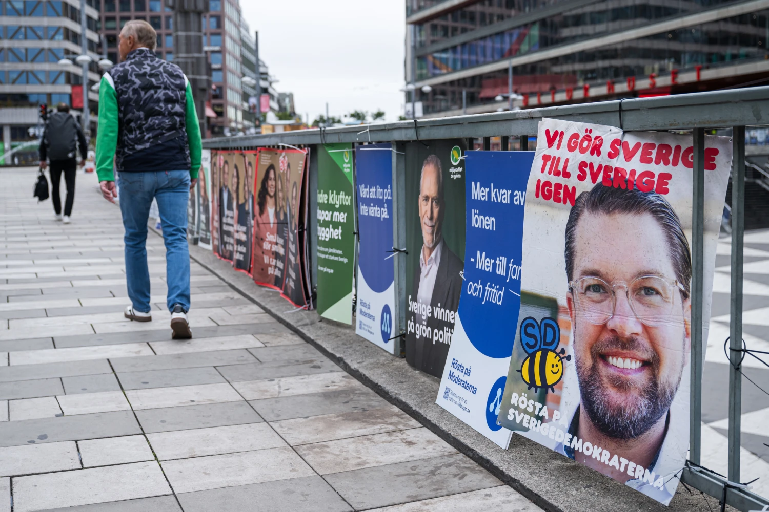 Election campaign posters featuring Sweden Democrats leader Jimmie Åkesson and candidates from other political parties are displayed in central Stockholm on September 7.