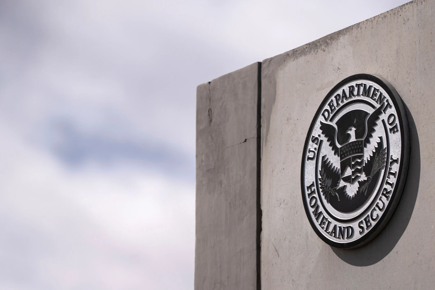 The seal of the US Department of Homeland Security outside the Nogales-Mariposa port of entry on the US-Mexico border in Nogales, Arizona, US, on Friday, Feb. 21, 2025.