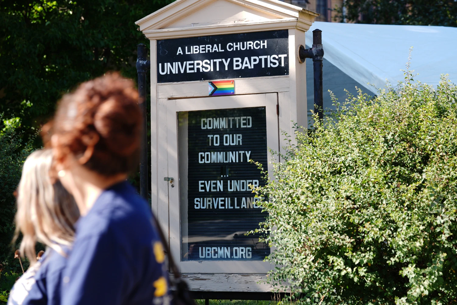 A sign outside University Baptist Church in Minneapolis criticizes surveillance.