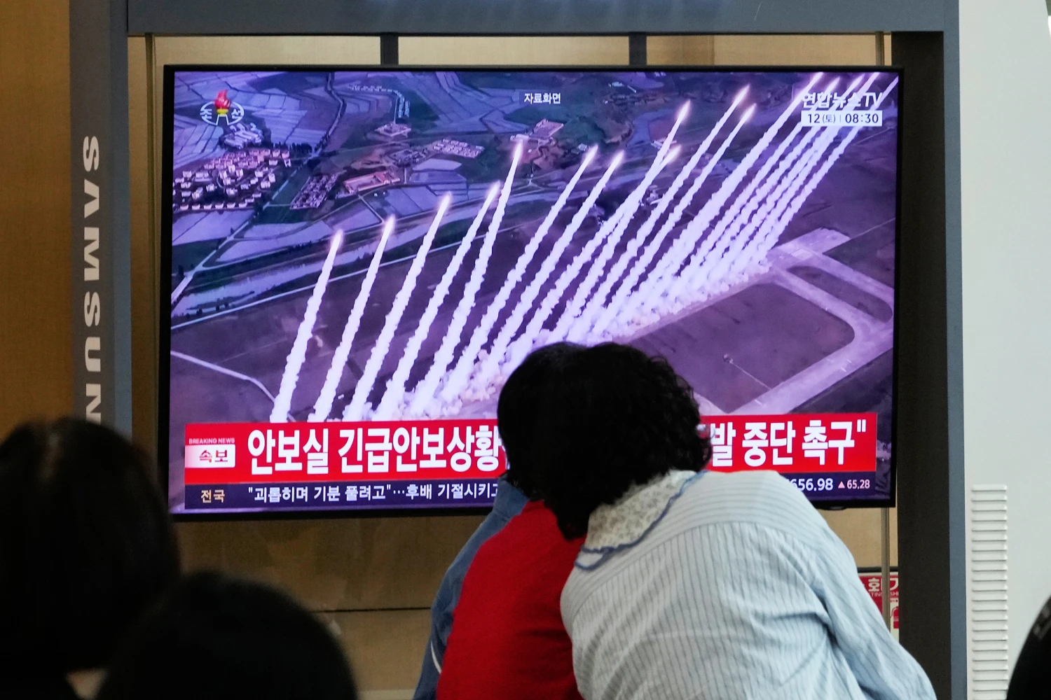 A TV screen shows a file photo of a North Korean missile launch during a news program at Seoul Railway Station in Seoul, South Korea, Saturday, Sept. 12, 2026.