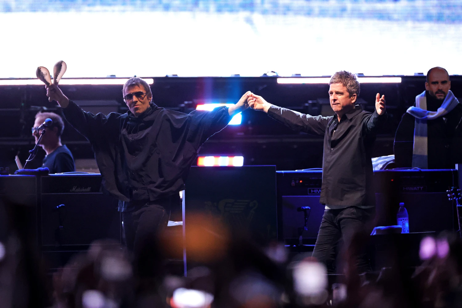 Liam Gallagher and Noel Gallagher walk out together during their Oasis Live ’25 world tour at MetLife Stadium on August 31, 2025 in East Rutherford, New Jersey.
