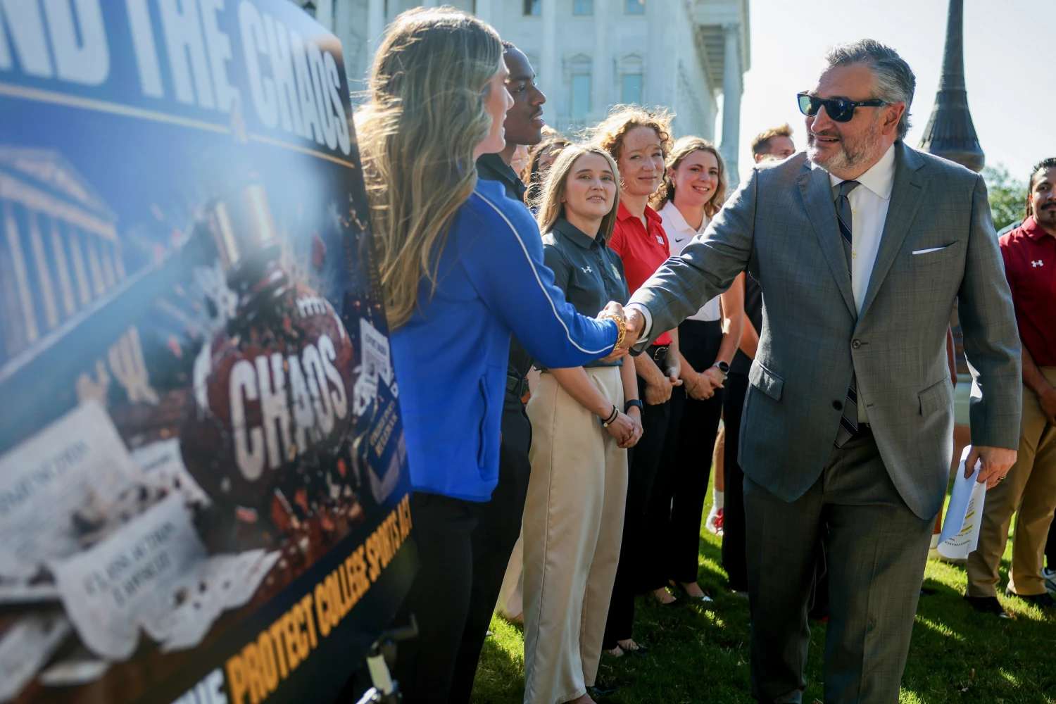 Ted Cruz greets NCAA athletes before a news conference about the Protect College Sports Act on Sept. 14, 2026, in Washington, D.C.