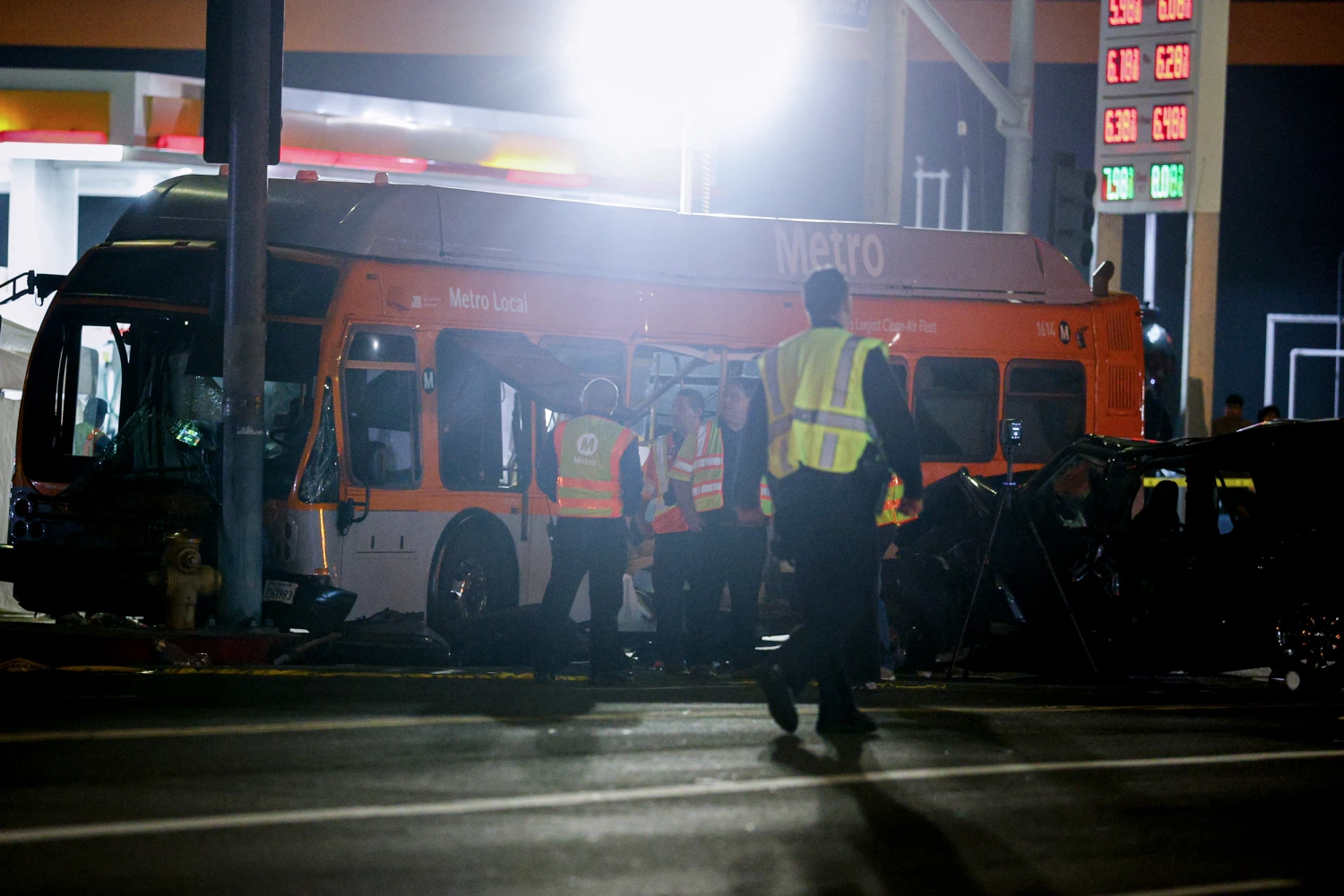 Law enforcement investigate the scene of a crash with a LA Metro Bus on Sept. 15, 2026, in Chatsworth, Calif.