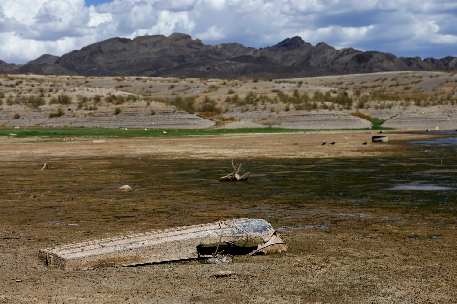 A boat sits in an area of Lake Mead that was previously underwater on Aug. 31, 2026, in Lake Mead National Recreation Area, Nev.