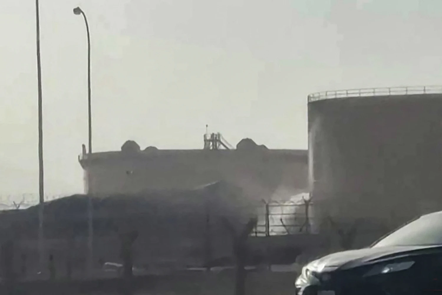 Smoke rising at the fuel depot near King Khalid International Airport on Saturday.