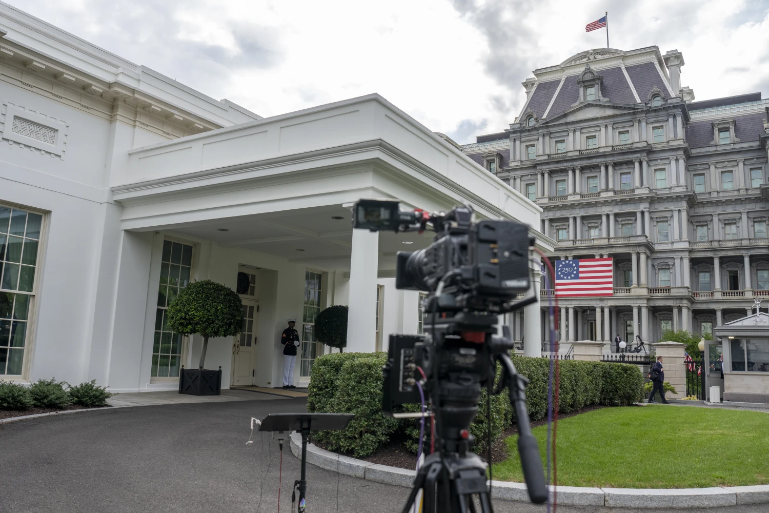 A television camera is pointed at the entrance to the West Wing of the White House on September 18.