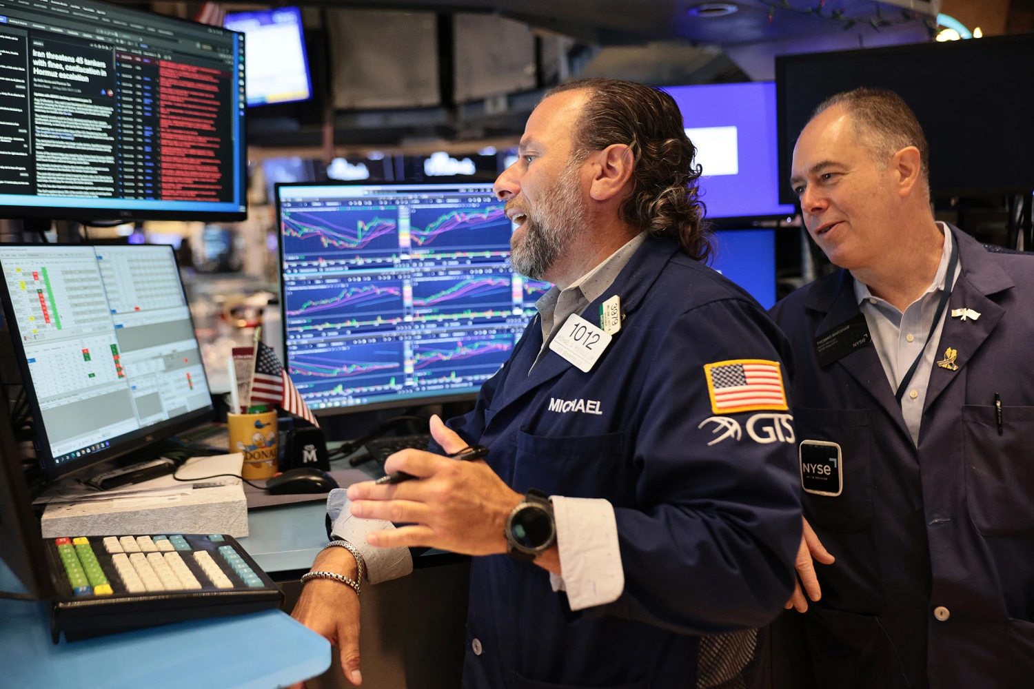Traders work on the floor of the New York Stock Exchange during morning trading on September 14, 2026 in New York City.