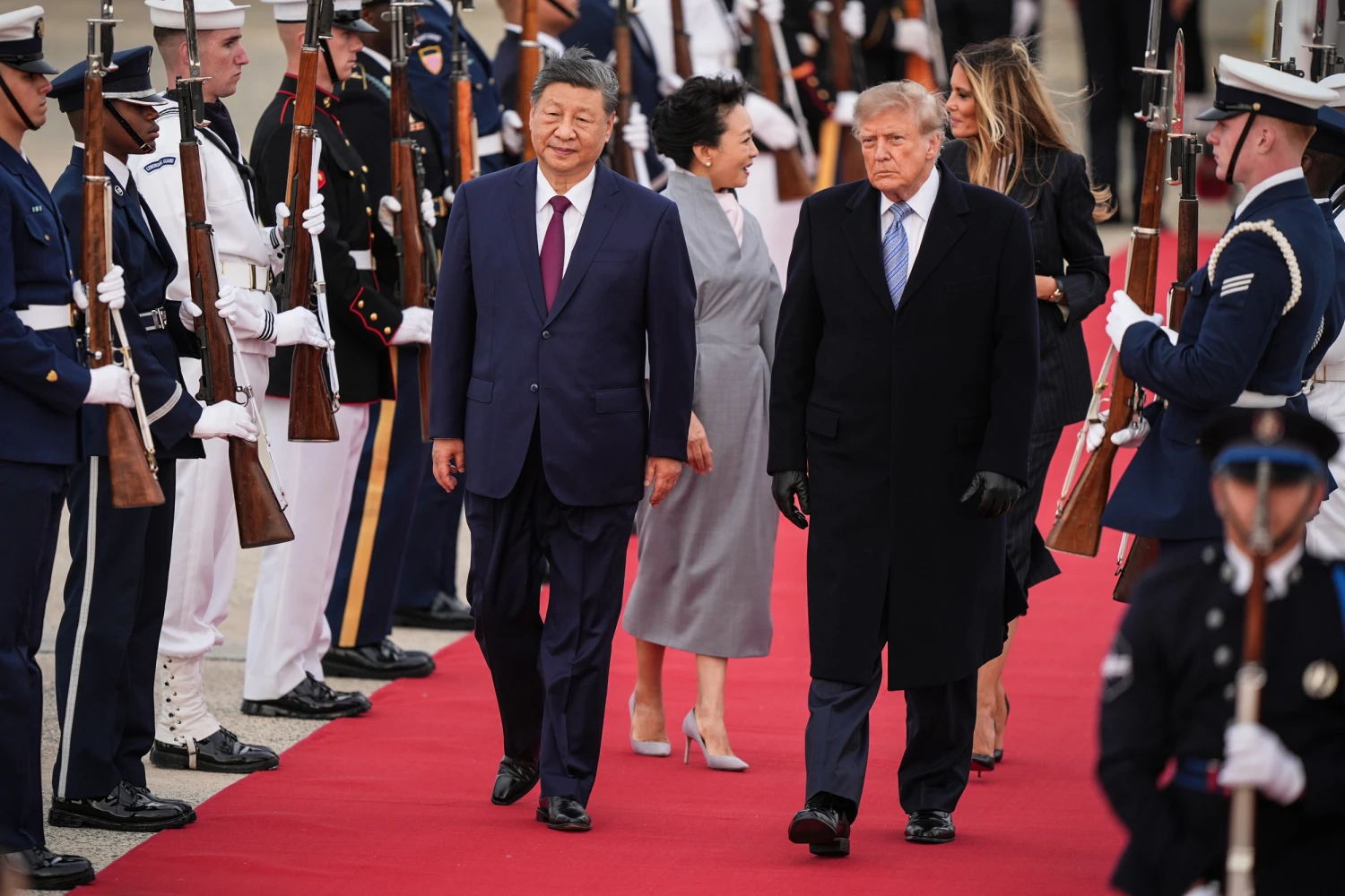 President Donald Trump and first lady Melania Trump greet Chinese President Xi Jinping and his wife Peng Liyuan as they arrive at Joint Base Andrews, Md., Wednesday, Sept. 23, 2026.