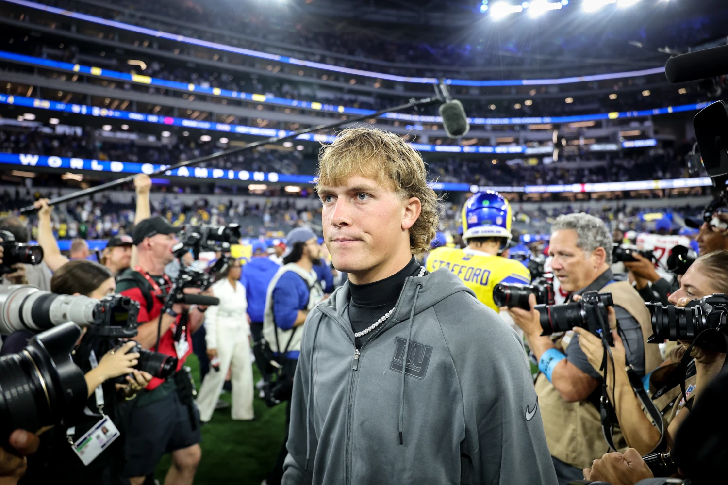 Giants starting quarterback Jaxson Dart leaves the field after the Rams' first home game of the 2026 regular season at SoFi Stadium on Sept. 21, 2026 in  Inglewood, Calif.