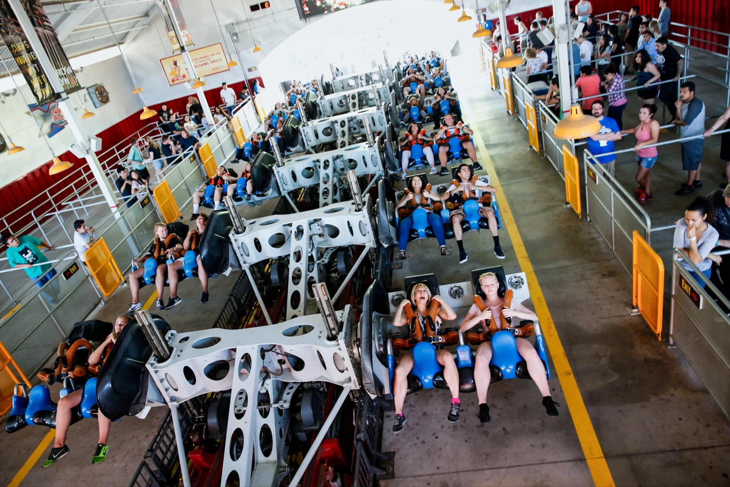 Visitors prepare to ride the X2 roller coaster at Six Flags Magic Mountain in Valencia, Calif., in 2015.