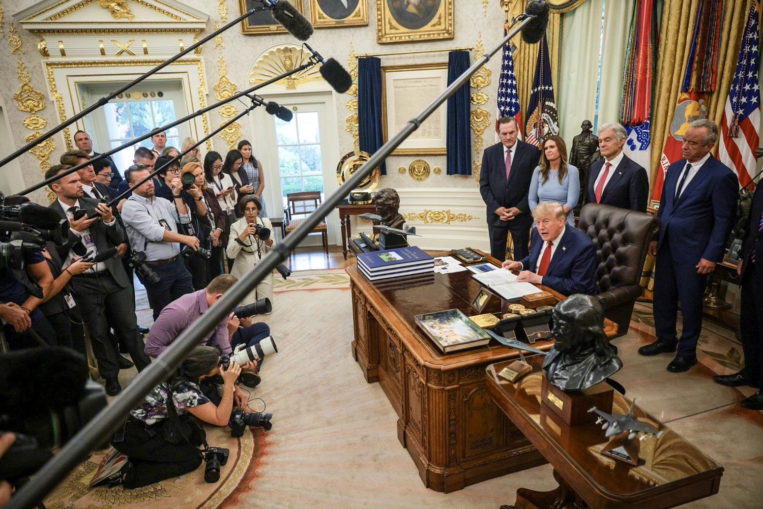 President Donald Trump speaks to reporters about healthcare in the Oval Office at the White House on Sept. 18, 2026.