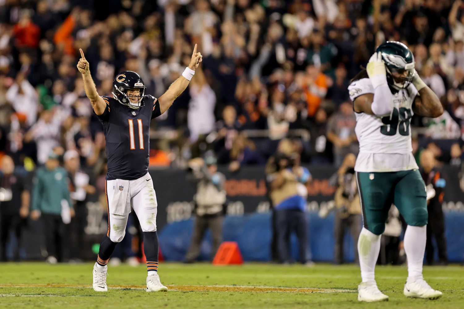 Case Keenum #11 of the Chicago Bears celebrates after Kalif Raymond #14 scored a 41 yard touchdown against the Philadelphia Eagles during the fourth quarter of the game at Soldier Field on September 28, 2026 in Chicago, Ill.