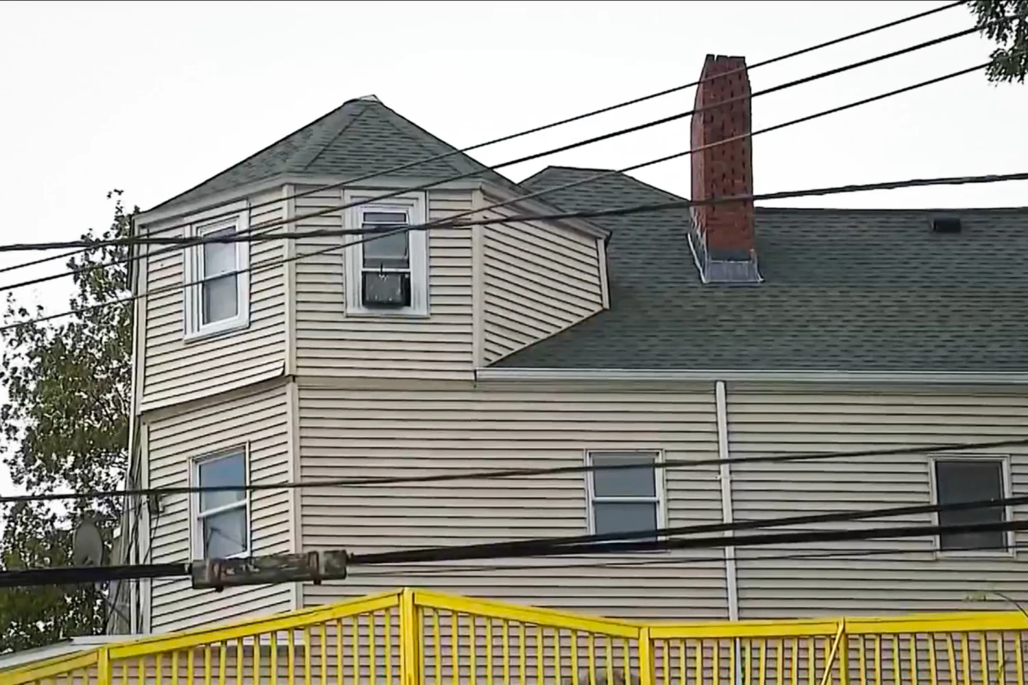 A multi-family home in Malden, Mass., where a woman was held for six weeks in the unfinished attic after being kidnapped and sexually trafficked.