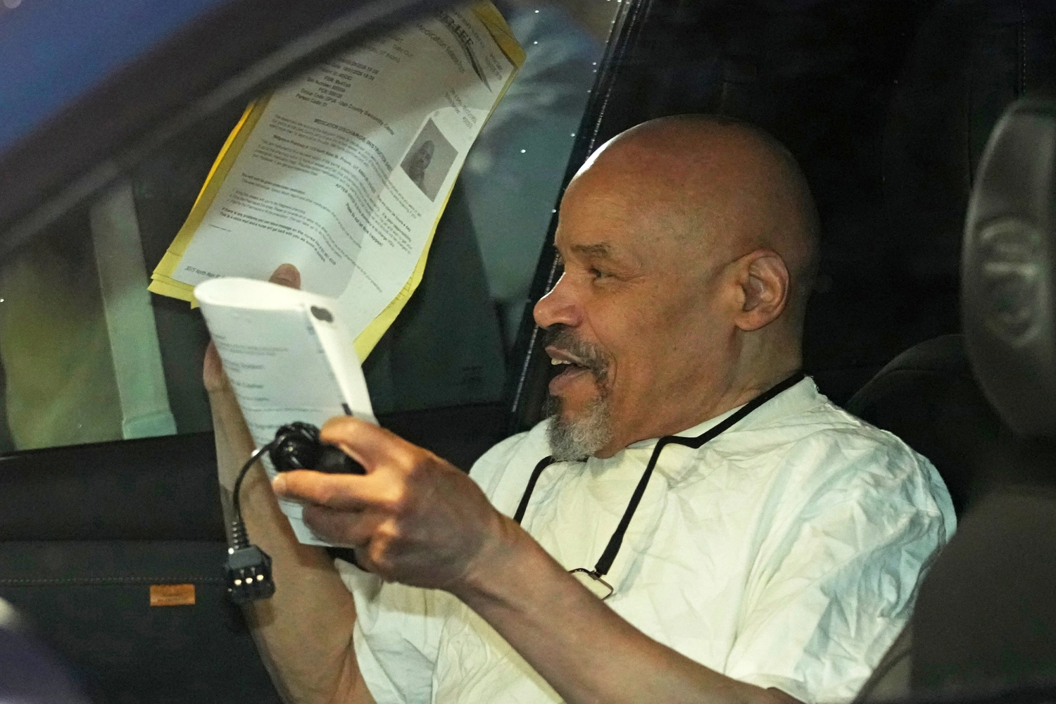 Douglas Stewart Carter sits in a car after he was released out of the Utah County Jail as a Utah judged ordered his release from jail on Monday Sept. 28, 2026, in Spanish Fork, Utah.