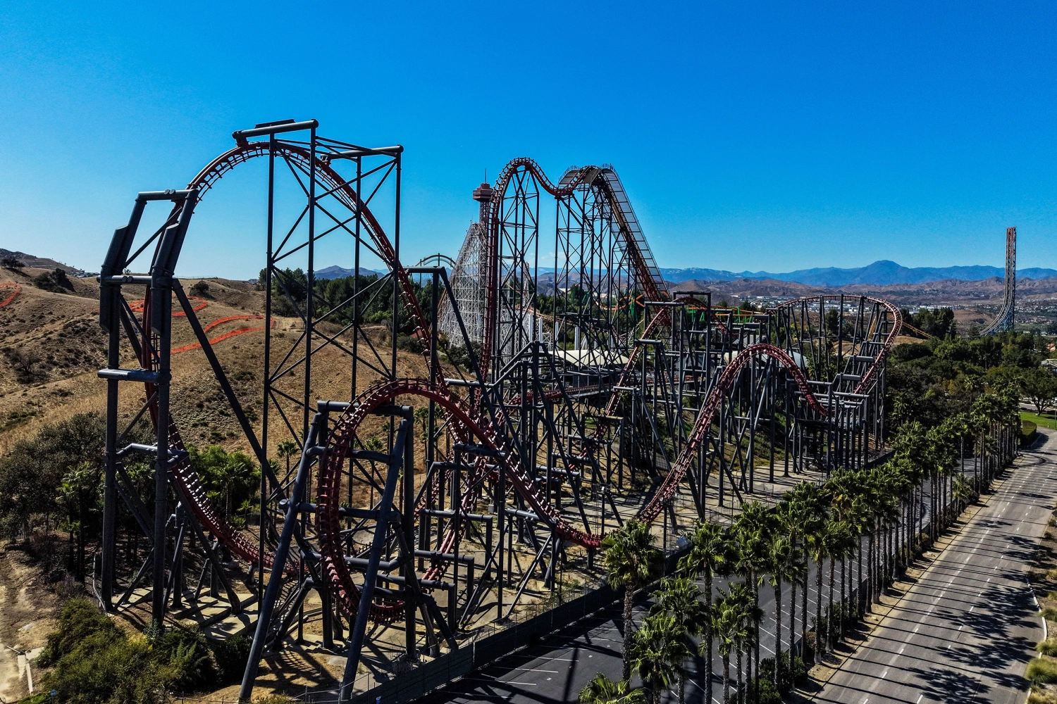 This aerial view shows the X2 roller coaster at Six Flags Magic Mountain in Valencia, Calif., Wednesday, Sept. 23, 2026.