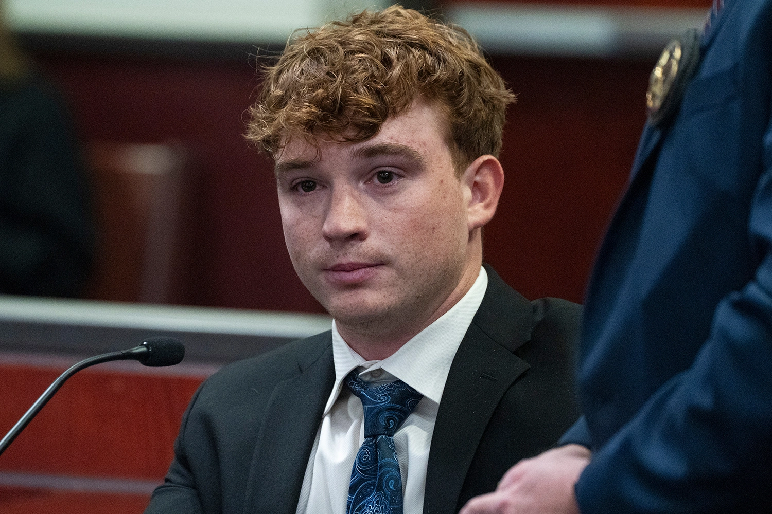 Carter Eslick is fingerprinted during his sentencing hearing in Coconino County Superior Court in Flagstaff, Ariz., on Sept. 30, 2026.
