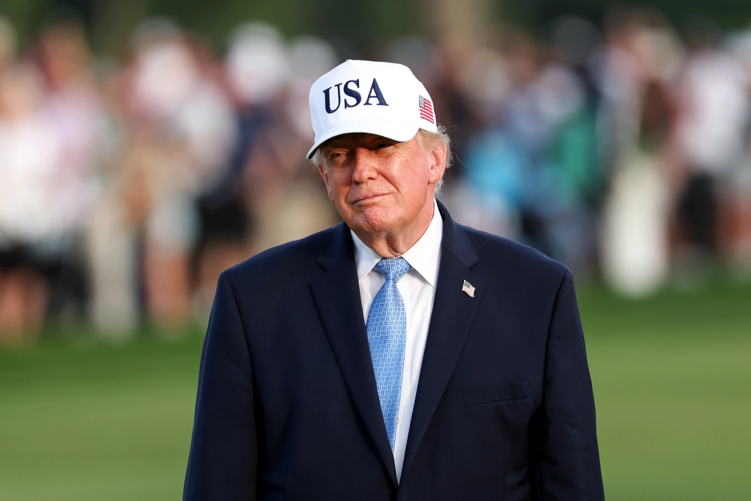 President Donald Trump looks on during the trophy ceremony after the U.S. Team wins 17-13 following the Sunday's Singles on day four of the Presidents Cup 2026 at Medinah Country Club on Sept. 27, 2026 in Medinah, Ill.