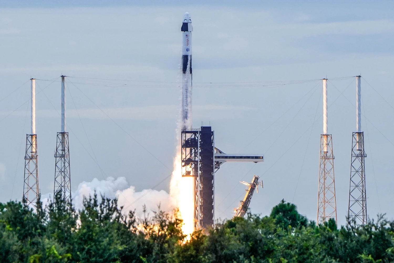 A SpaceX Falcon 9 rocket with a crew of four launches from pad 40 at the Cape Canaveral Space Force Station in Cape Canaveral, Fla., on Oct. 1, 2026.