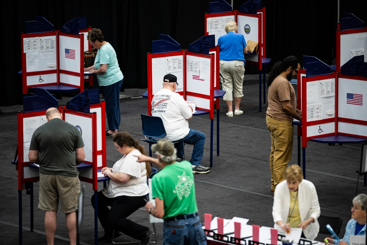 Voters and election officials at a polling location inside the Augusta Civic Center, during a primary election in Augusta, Maine, US, on Tuesday, June 9, 2026.