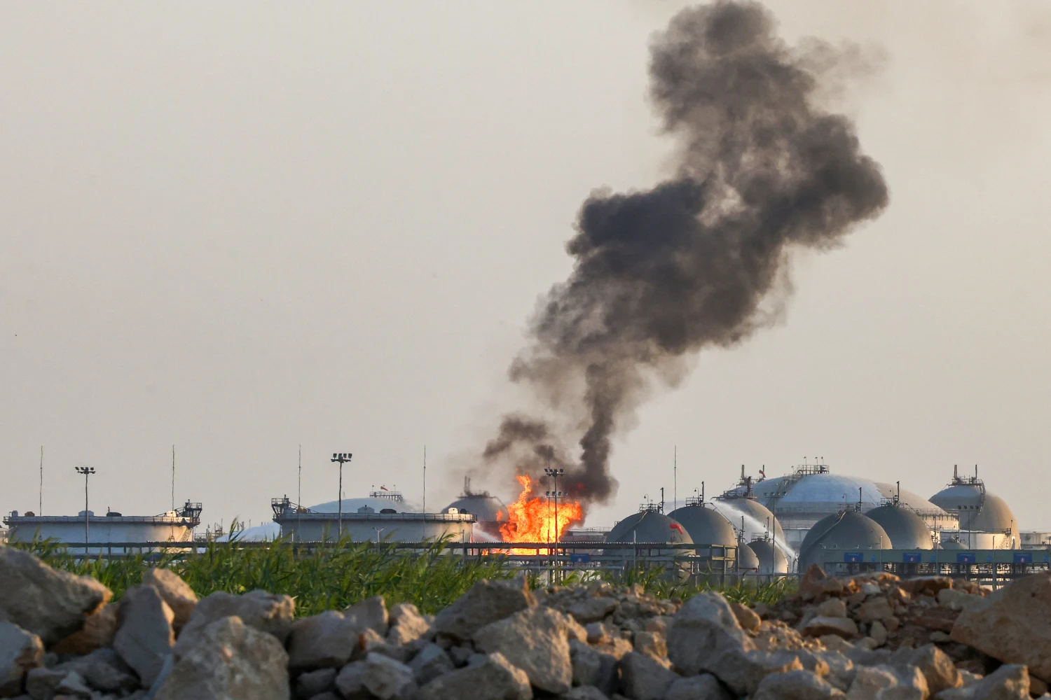 Flames burn at a facility belonging to Saudi oil giant Aramco south of Riyadh on Oct. 3, 2026.