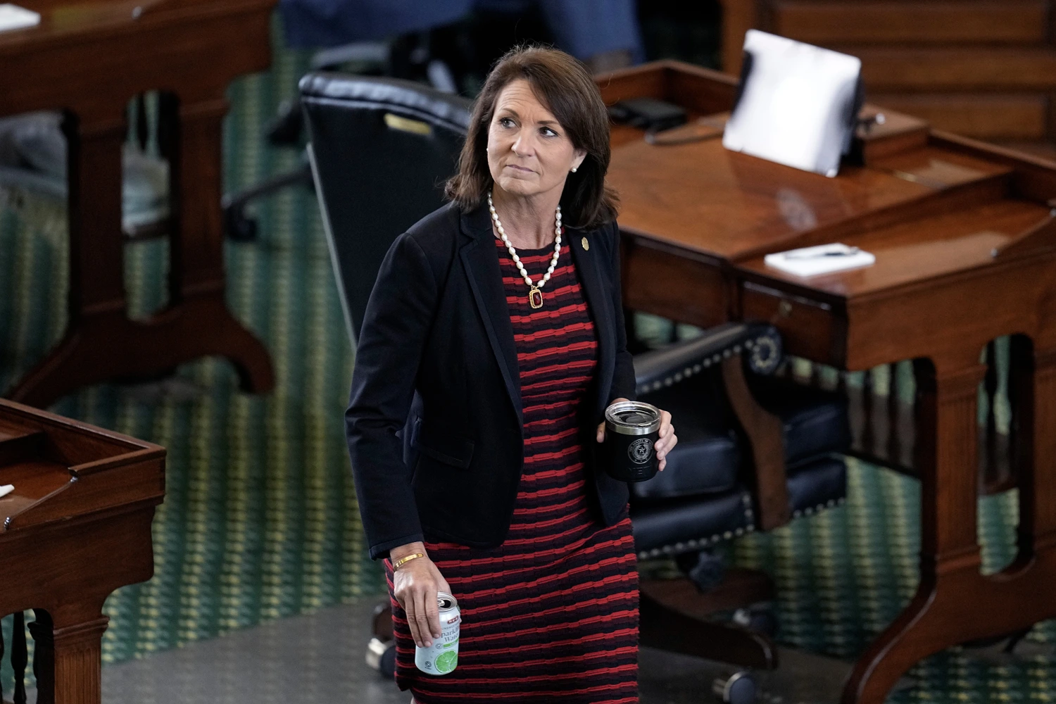 Texas state Sen. Angela Paxton, R-McKinney, wife of suspended Texas state Attorney General Ken Paxton, walks through the Senate Chamber during the impeachment trial for her husband at the Texas Capitol in Austin, Sept. 16, 2023.