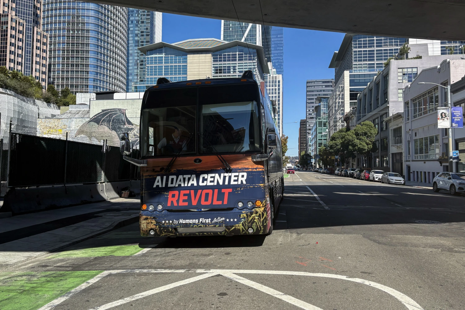 The tour bus used by Humans First in its 8,000+ mile trip cross country, visiting over 35 locations and rallying communities around guardrails for AI and data centers. Parked ia few hundred feet away from Anthropic's headquarters in San Francisco on Oct., 05, 2026.
