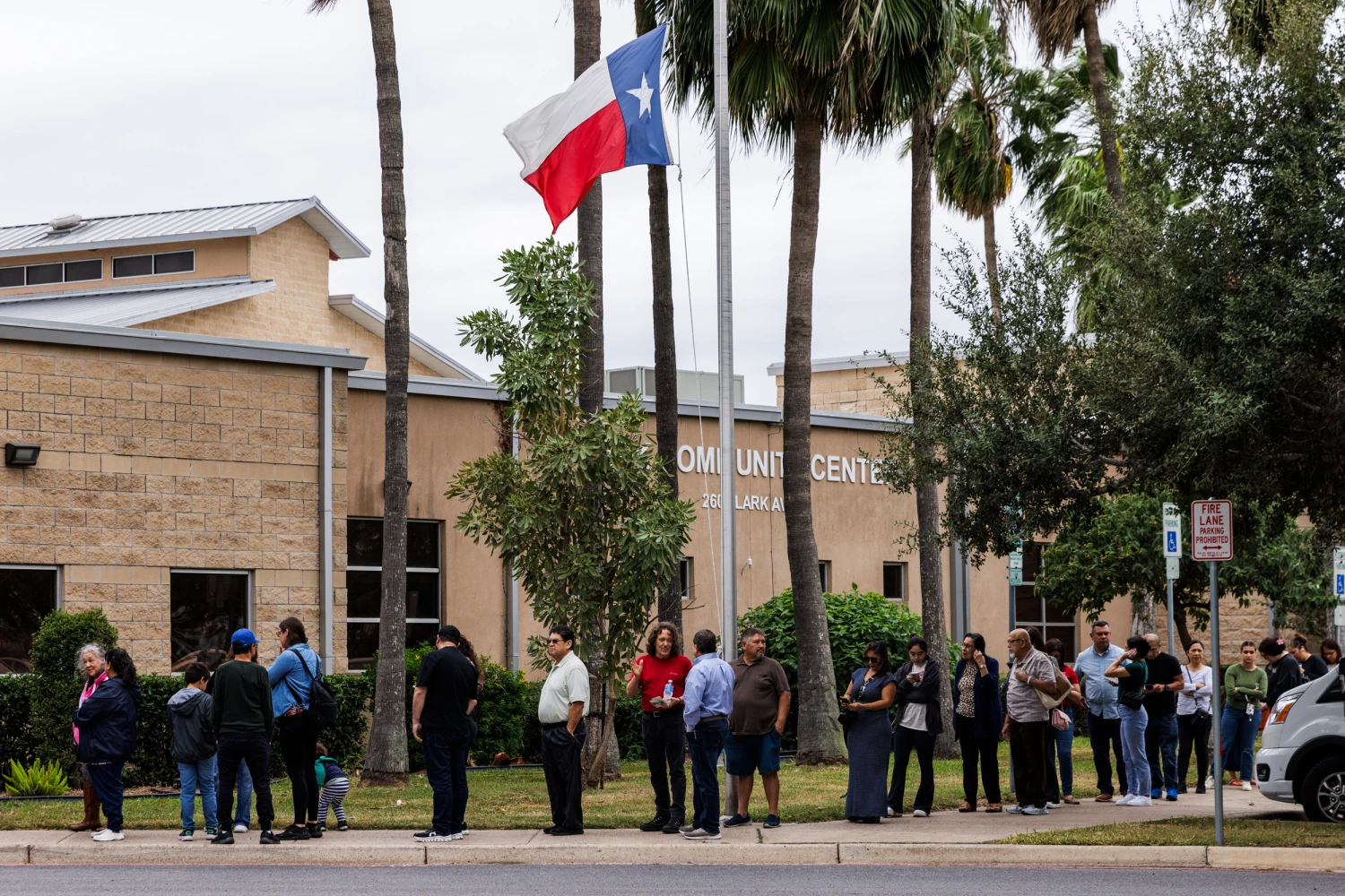 Voters wait outside of a polling place on November 5, 2024 in McAllen, Texas.