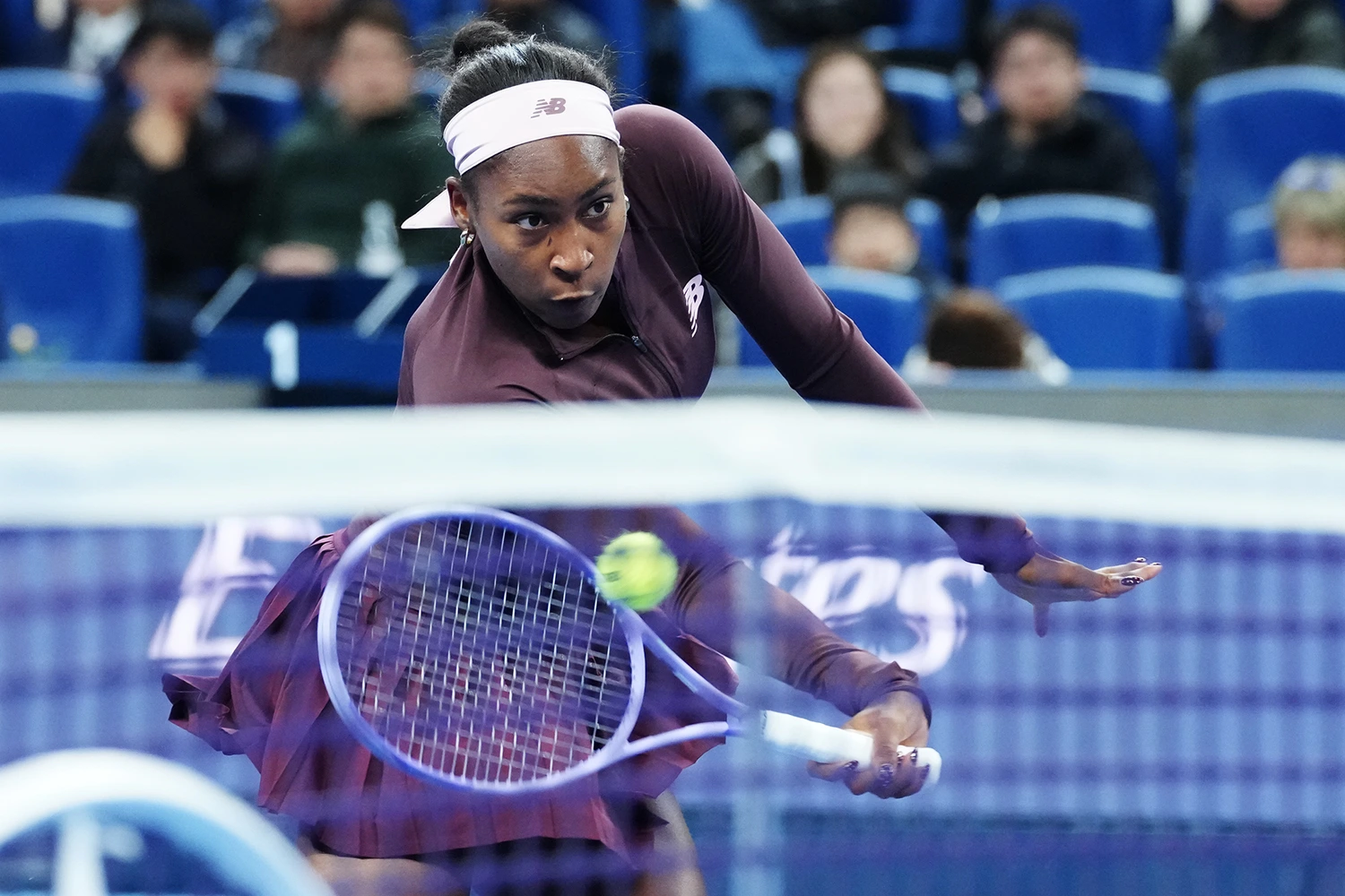 Coco Gauff in action against Xinran Sun of China during their Women's Singles match at the China Open in Beijing on Oct. 5, 2026.