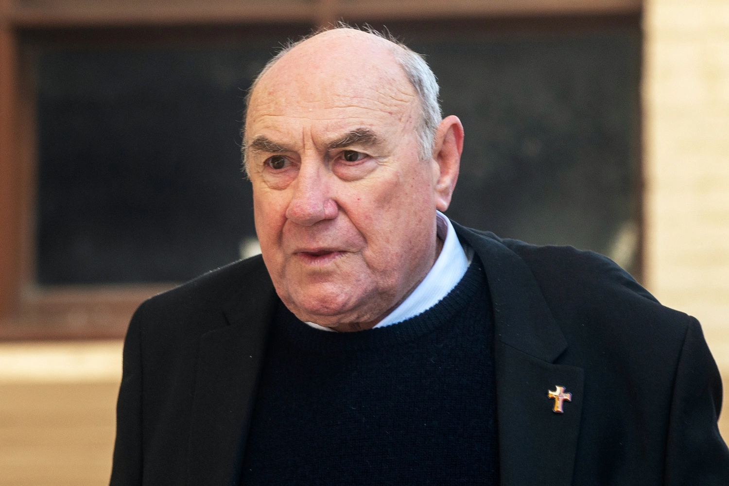 Former Bishop of Broome Christopher Alan Saunders arrives at the West Australian District Court in Perth, Australia, on Aug. 11, 2026. (Aaron Bunch/AAP Image via AP)