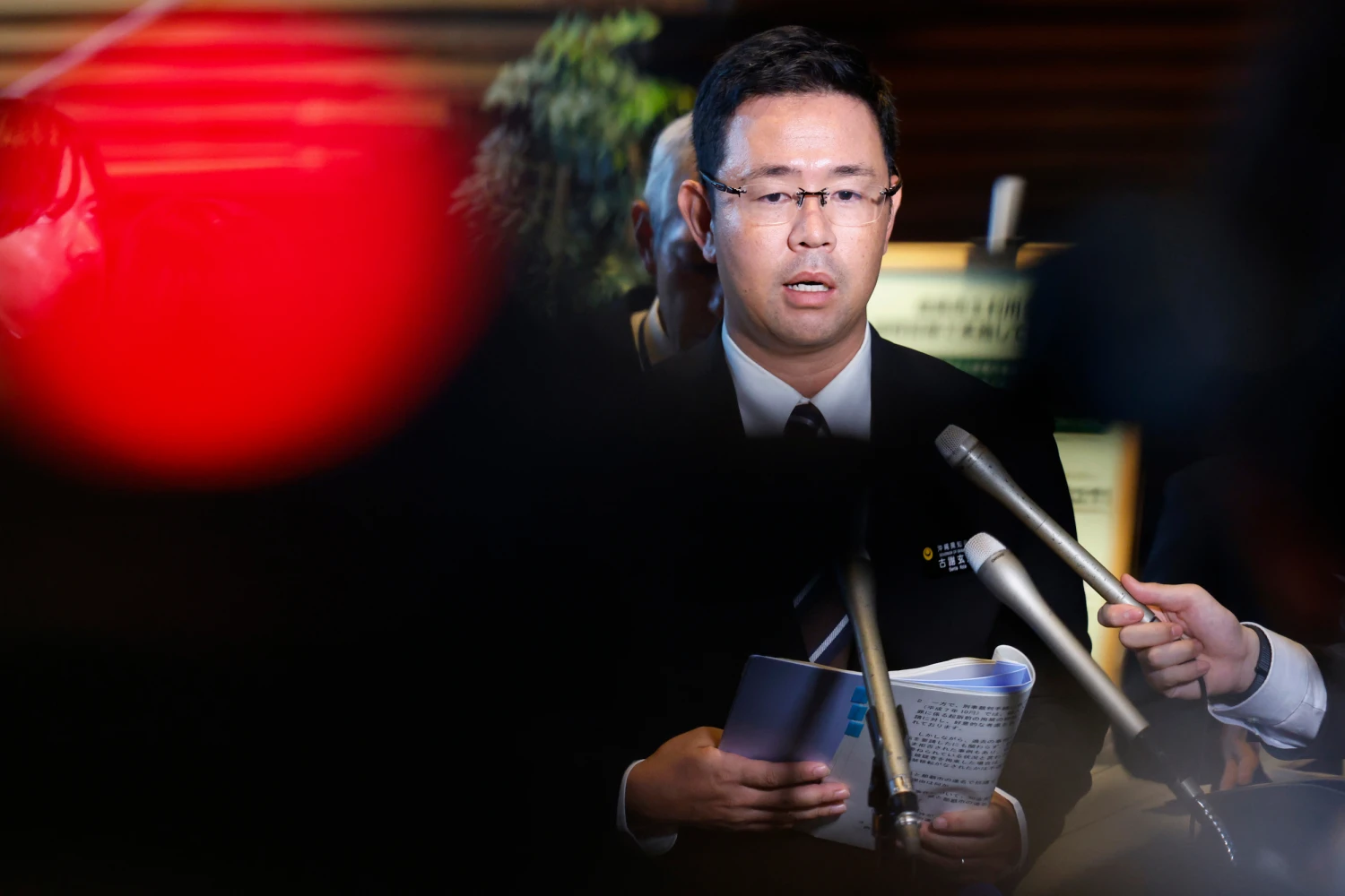 Okinawa Governor Genta Koja speaks to reporters after his meeting with Japanese Prime Minister Sanae Takaichi at the prime minister's office in Tokyo, Japan, Wednesday, Oct.7, 2026.