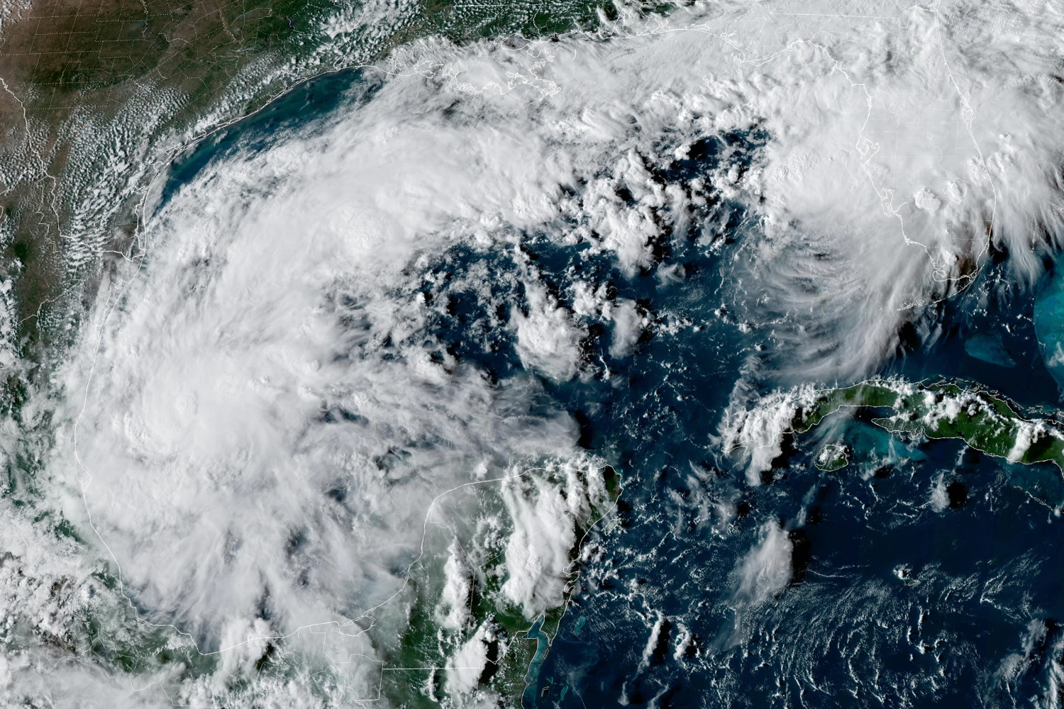 This satellite image from the National Oceanic and Atmospheric Administration shows Tropical Depression Nine forming over the Gulf of Mexico on Tuesday, Oct. 6, 2026.