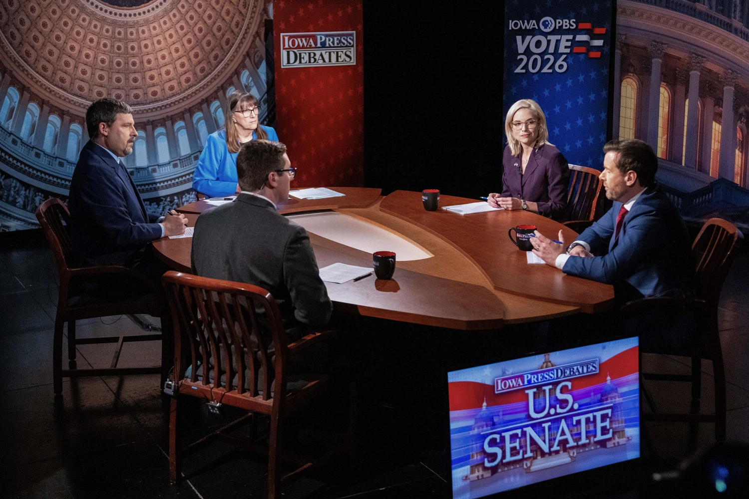 Iowa Senate candidates Ashley Hinson and Josh Turek take questions during a debate on Oct. 7, 2026, at Iowa PBS in Johnston.
