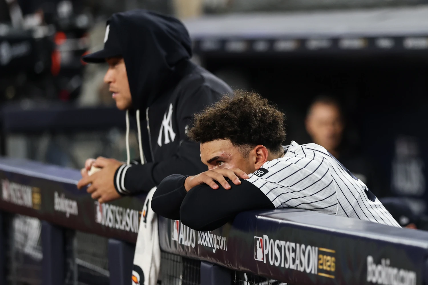 George Lombard Jr. #96 and Aaron Judge #99 of the New York Yankees react after being defeated by the Tampa Bay Rays in game three of the American League Division Series at Yankee Stadium on Oct., 07, 2026 in New York.