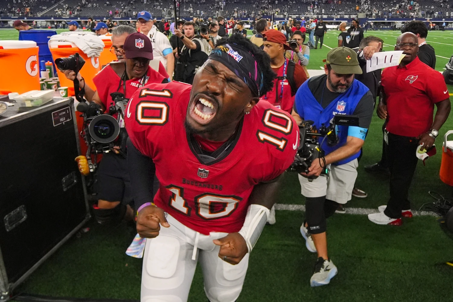 Tampa Bay Buccaneers quarterback Jalon Daniels (10) yells as he leaves the field after beating the Dallas Cowboys in an NFL football game in Arlington, Texas on Thursday, Oct. 8, 2026.