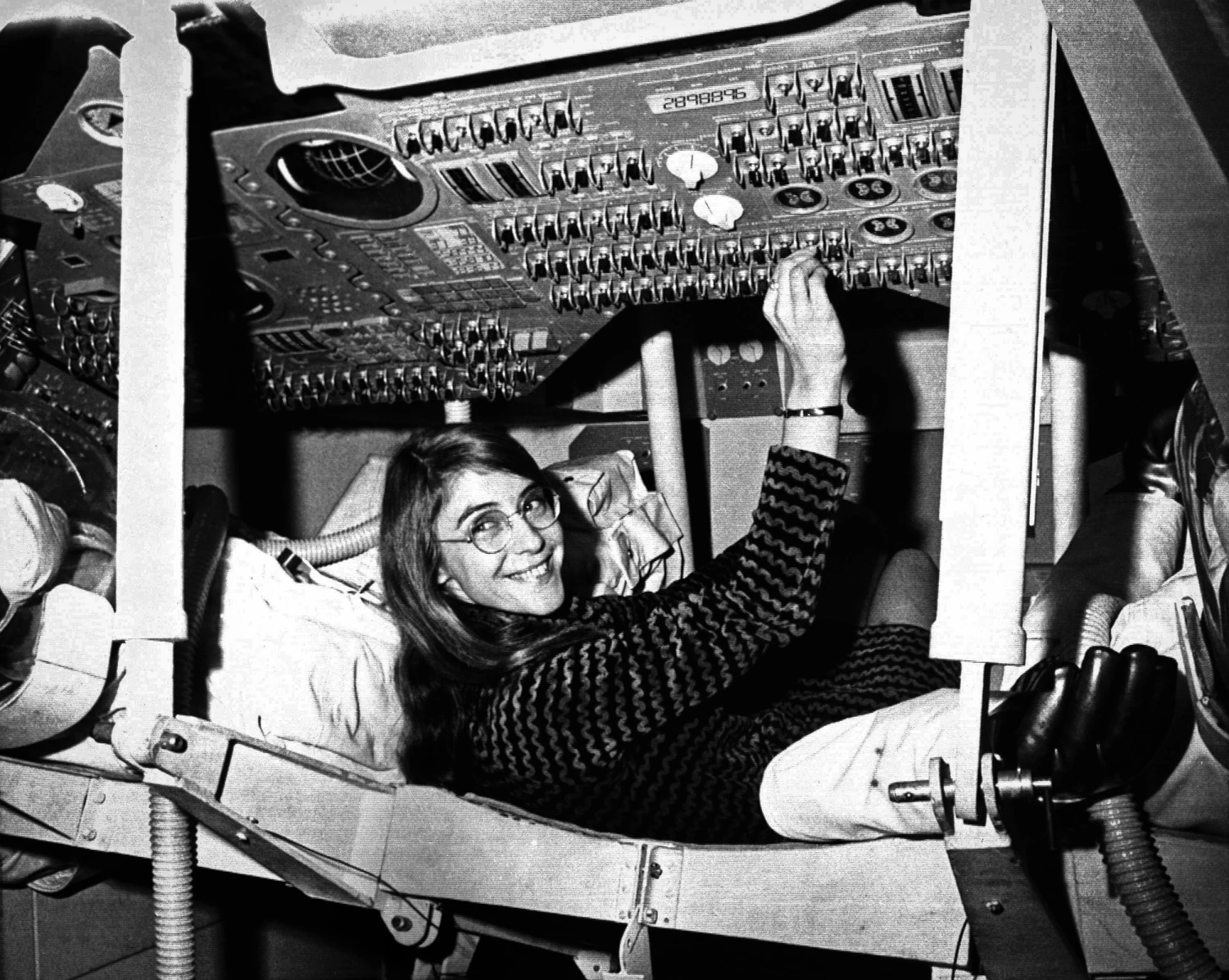Margaret Hamilton sits in a mock-up of the Apollo command module in 1969.