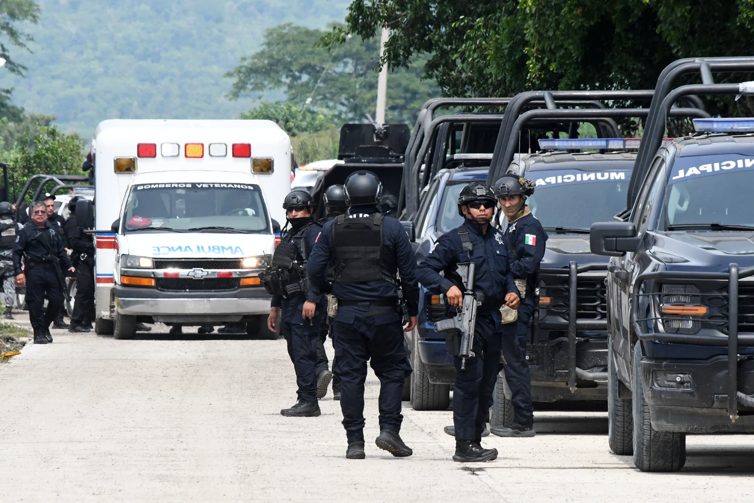 Police officers gather in front of the El Castillo Penitentiary during a riot in Mazatlan, Mexico, Thursday, Oct. 8, 2026.