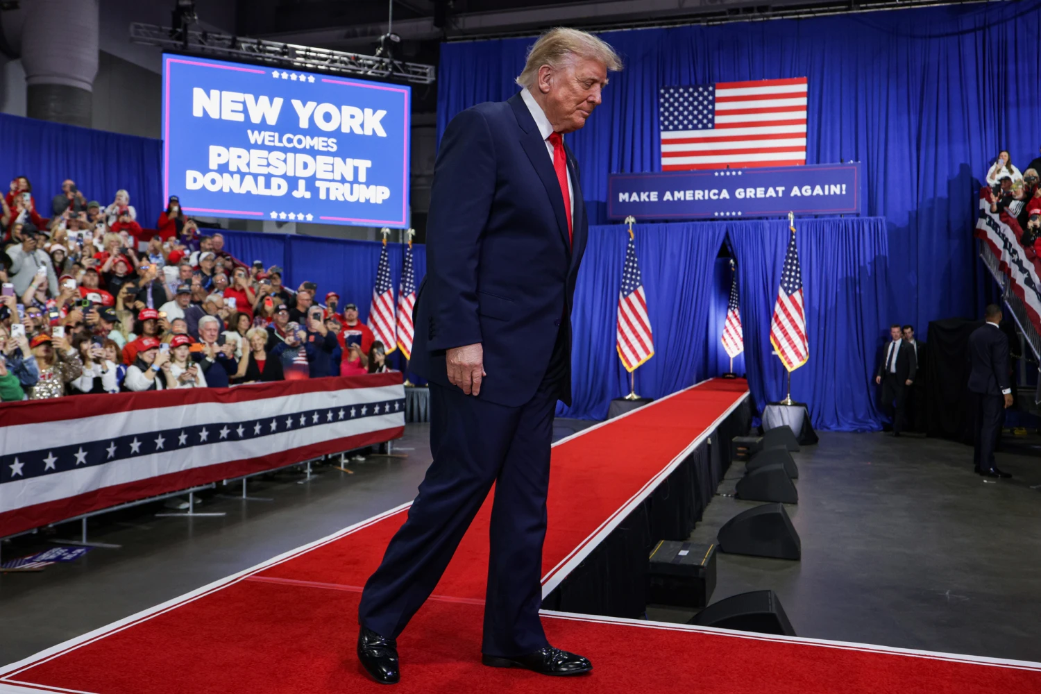 U.S. President Donald Trump takes the stage to speak during an election rally at the Oncenter on October 09, 2026 in Syracuse, N.Y.