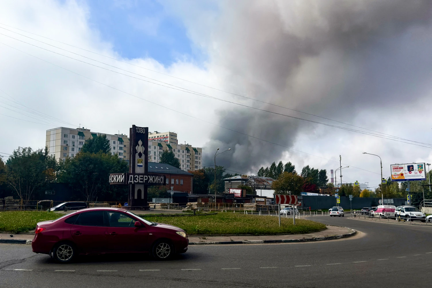 Smoke rises from Gazprom Neft's Moscow oil refinery as seen from Dzerzhinsky, in the Moscow region, last month.