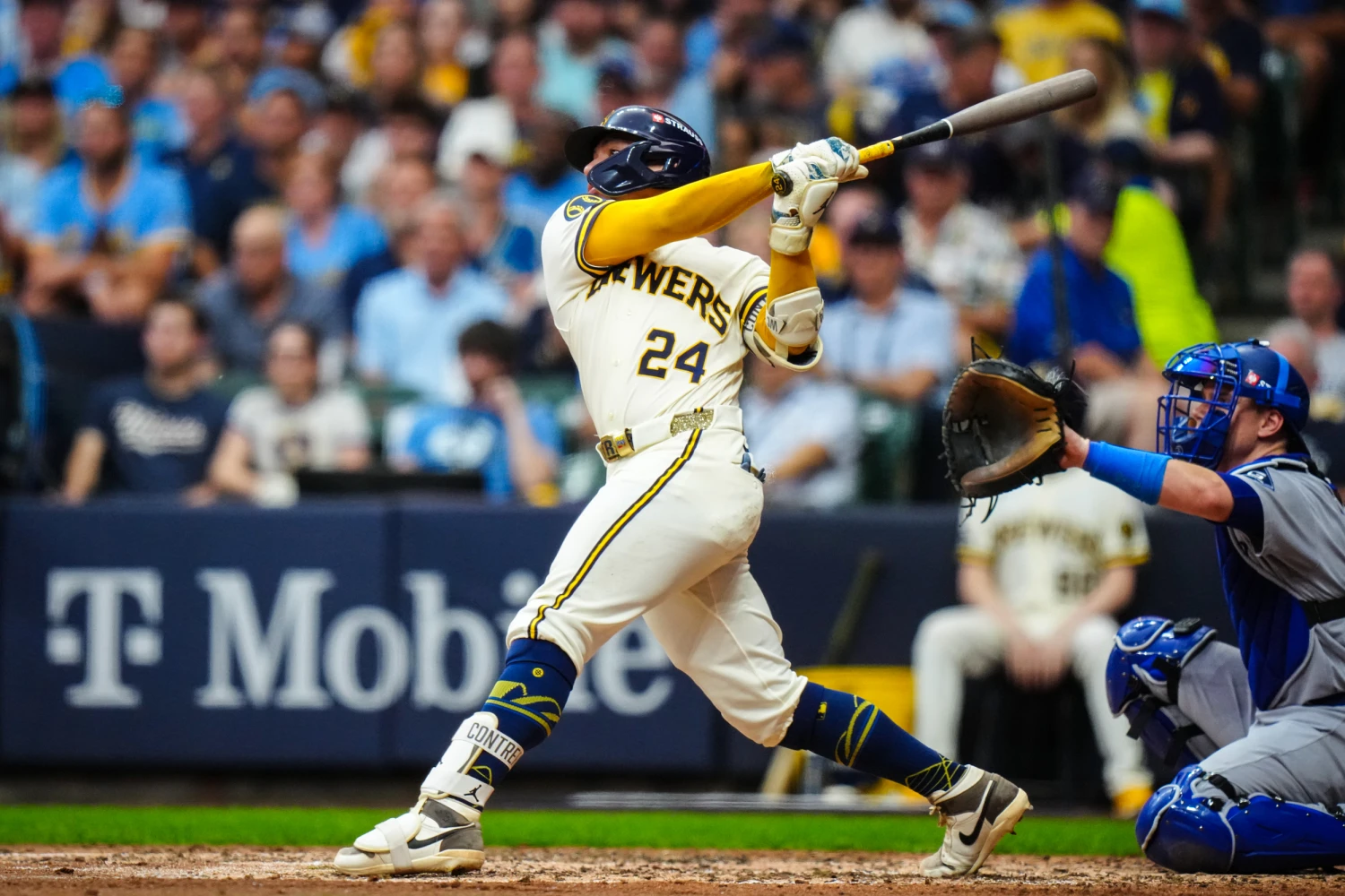 William Contreras #24 of the Milwaukee Brewers hits a solo home run in the fifth inning during Game Two of the National League Championship Series between the Los Angeles Dodgers and the Milwaukee Brewers at American Family Field on Monday, Oct. 12, 2026 in Milwaukee.