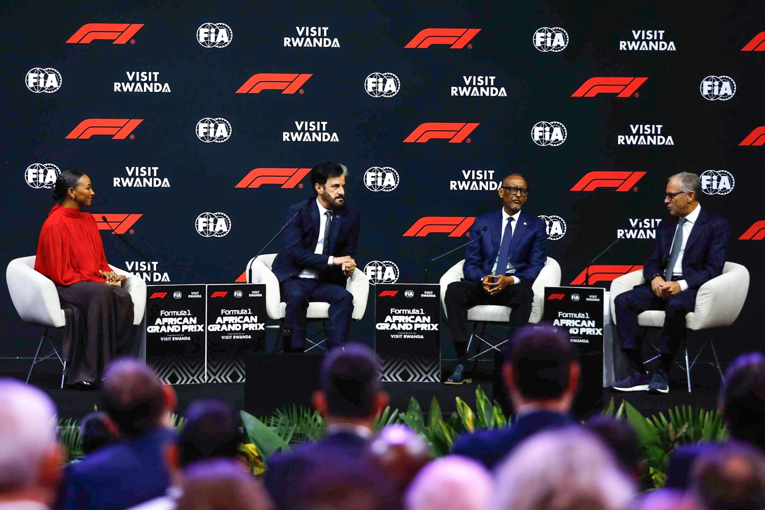 Mohammed ben Sulayem, FIA President, Paul Kagame, President of the Republic of Rwanda and Stefano Domenicali, CEO of the Formula One Group talk on stage with Naomi Schiff after announcing a Formula 1 race to be hosted in Rwanda from the 2030s during a Formula 1 announcement at BK Arena on Oct. 13, 2026 in Kigali, Rwanda.