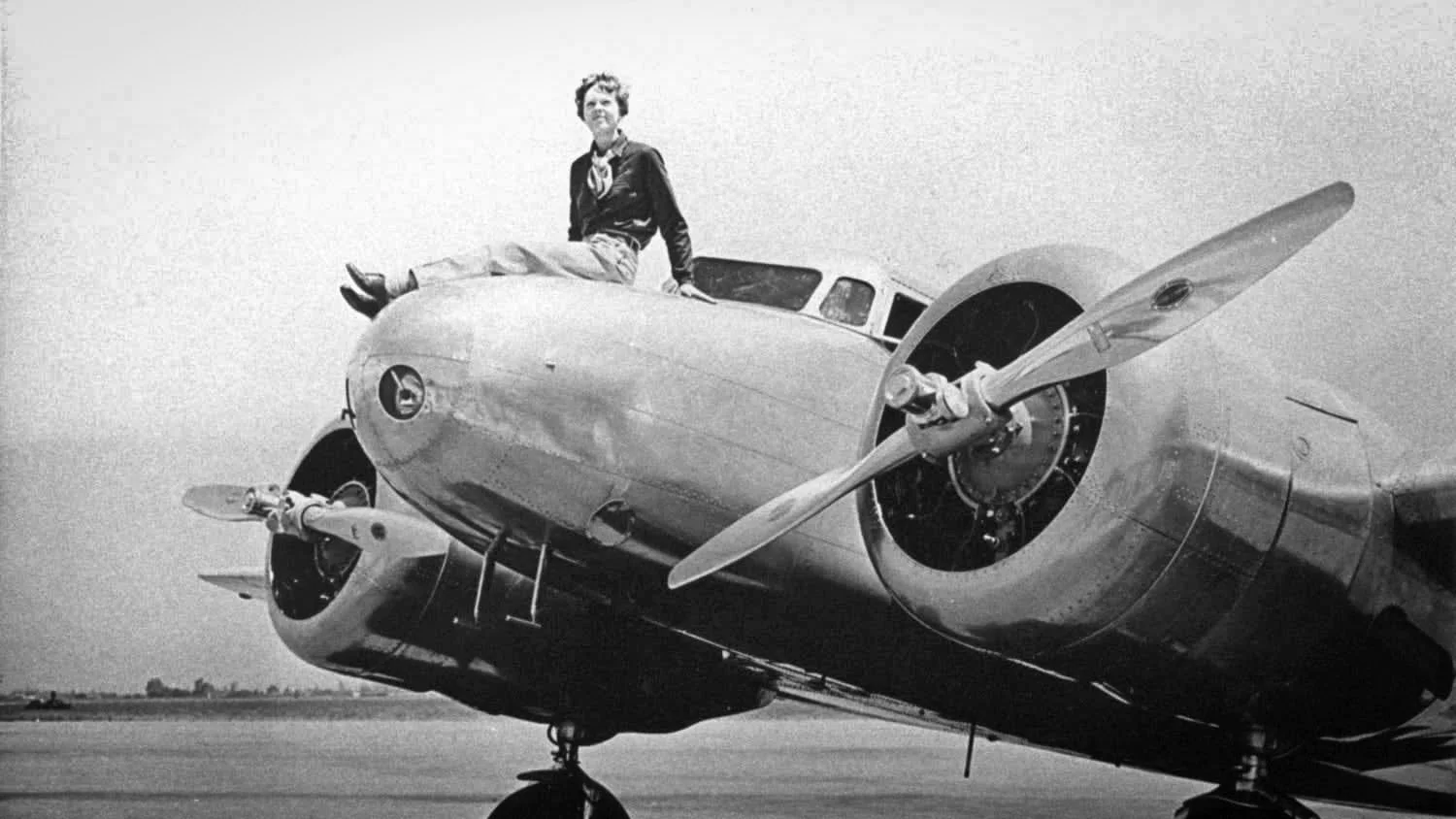 Amelia Earhart on the nose of her Lockheed Electra, on March 12, 1937.