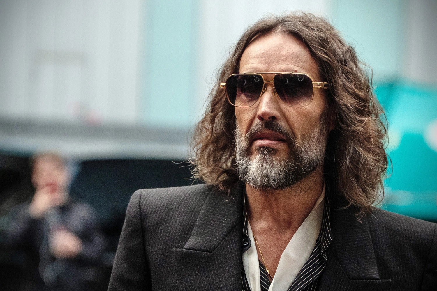 British comedian, actor, podcaster, and media personality, Russell Brand arrives at Southwark Crown Court on October 14, 2026 in London, England.