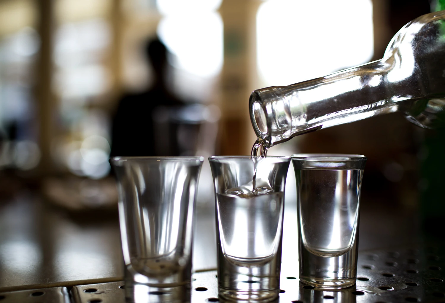 Mezcal, an agave spirit , is poured into shot glasses at Doves Luncheonette in the Wicker Park neighborhood of Chicago, Illinois, May 7, 2015.