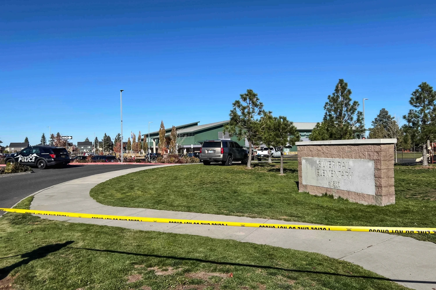 Police tape is placed outside Silver Rail Elementary school, where a shooting took place, on Oct. 15, 2026 in Bend, Ore.