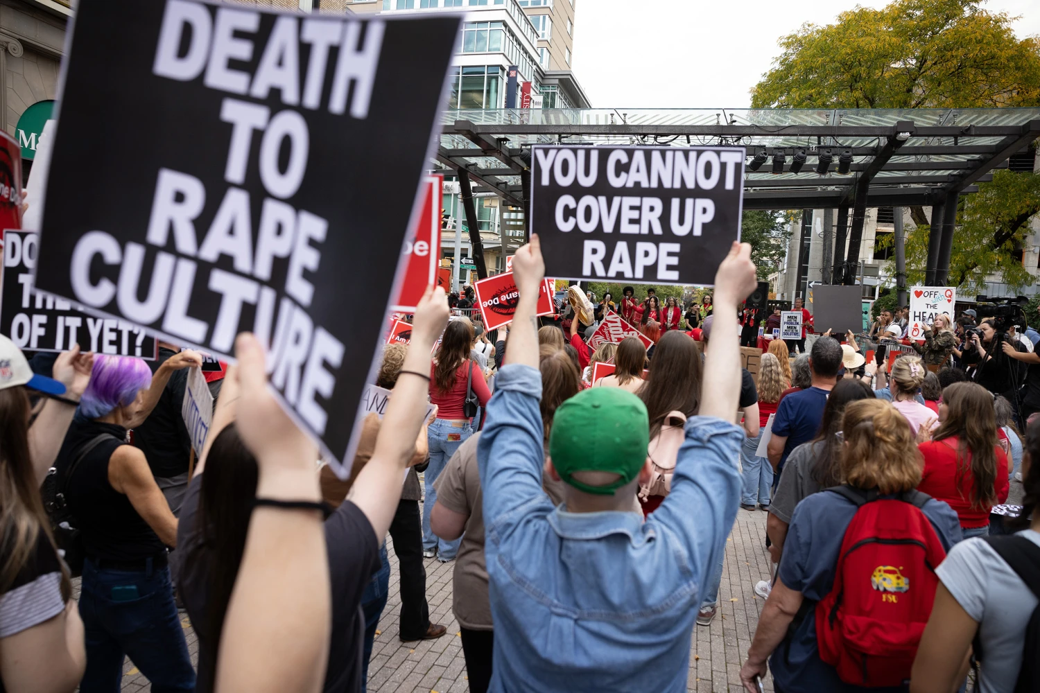 Protesters listen to speakers at a rally at Ithaca Commons in Ithaca, New York, United States, on October 13, 2026.